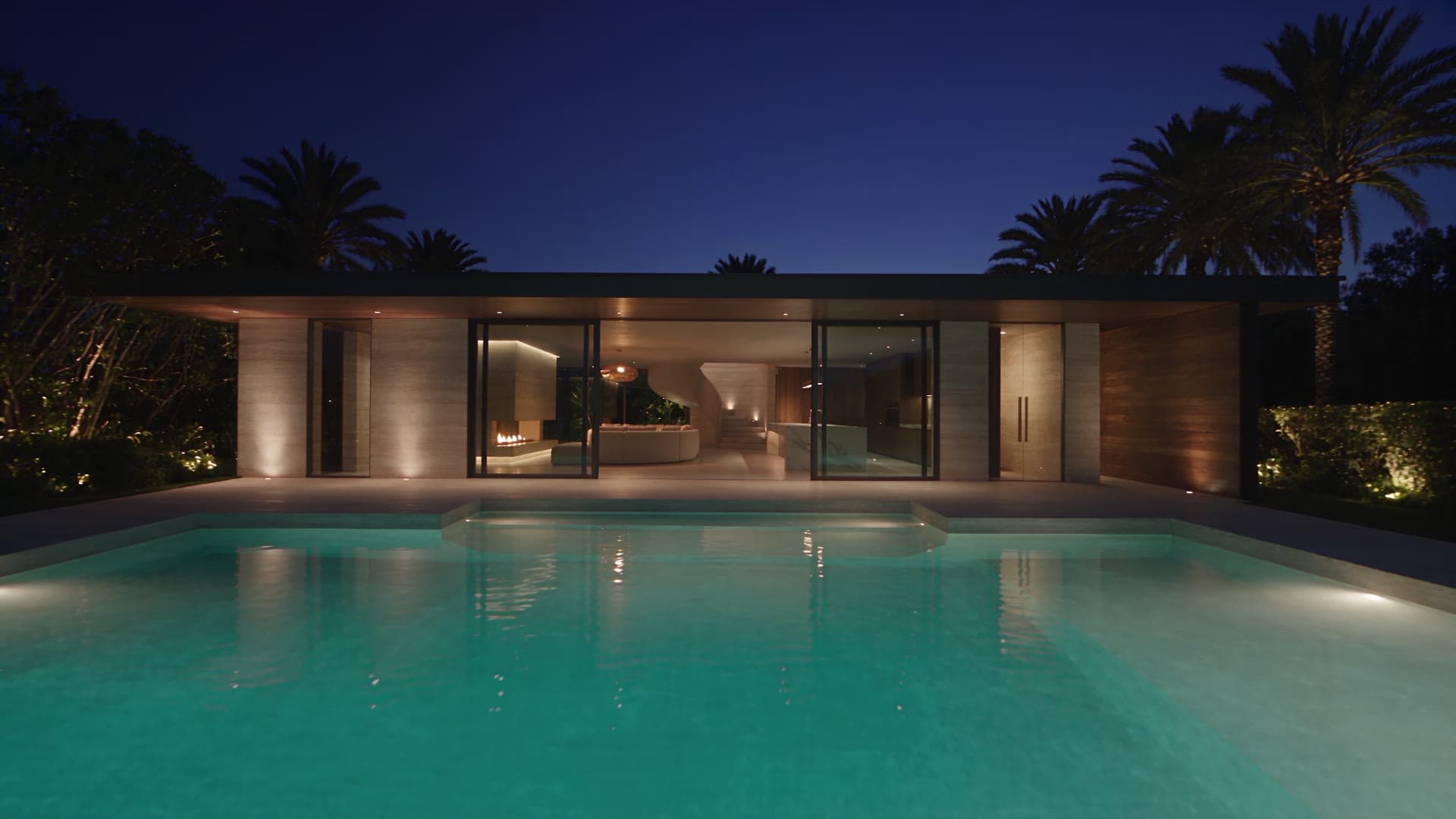 Night view of a private luxury villa, illuminated pool and terrace